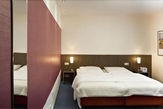 Imagen de la habitación del Hotel Aigner. Foto 11