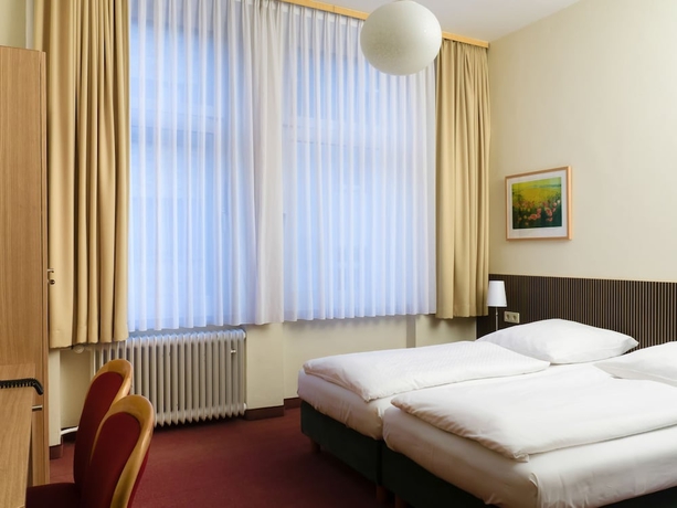 Imagen de la habitación del Hotel Aigner. Foto 12