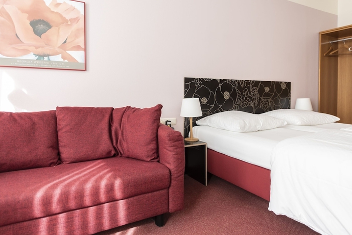 Imagen de la habitación del Hotel Aigner. Foto 15