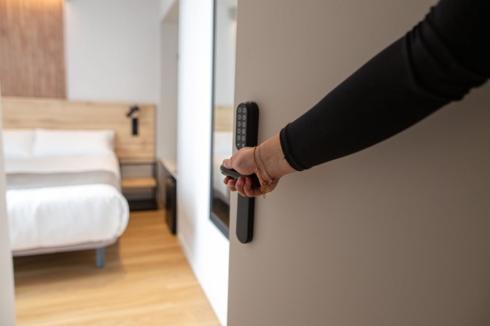 Imagen de la habitación del Hotel Aila II Boutique. Foto 14