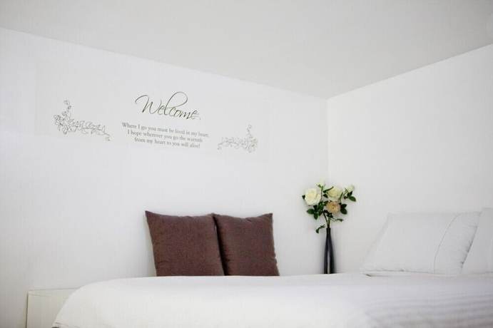 Imagen de la habitación del Hotel Aileen Pension. Foto 14