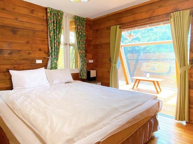 Imagen general del Hotel Ailiga Travel Villa, Youshi. Foto 4