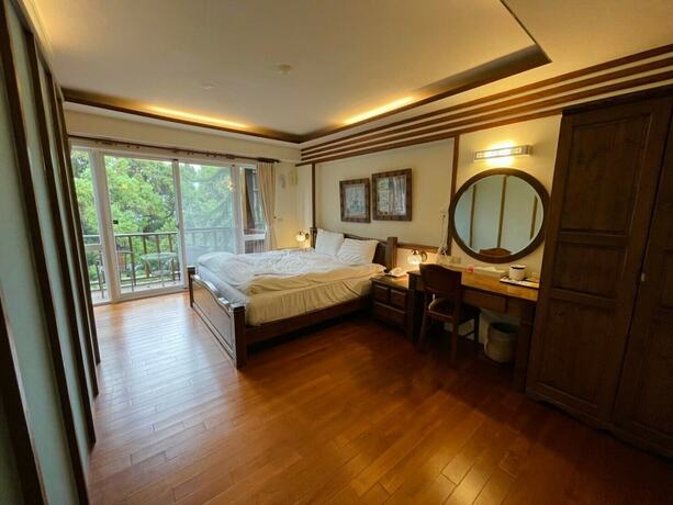 Imagen de la habitación del Hotel Ailiga Travel Villa, Youshi. Foto 14