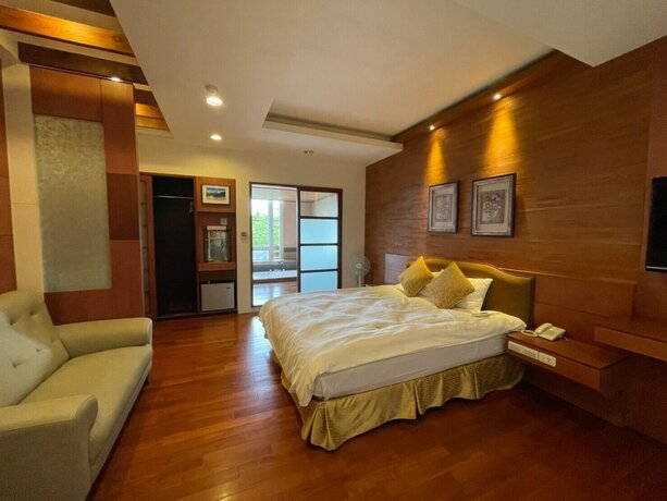 Imagen de la habitación del Hotel Ailiga Travel Villa, Youshi. Foto 17