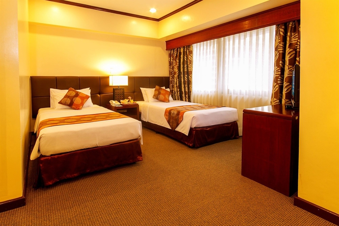 Imagen de la habitación del Hotel Aim Conference Center Manila. Foto 5