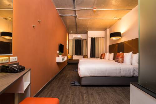 Imagen de la habitación del Hotel Aim House Bangkok. Foto 6