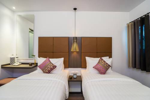 Imagen de la habitación del Hotel Aim House Bangkok. Foto 9