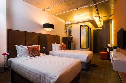 Imagen de la habitación del Hotel Aim House Bangkok. Foto 12
