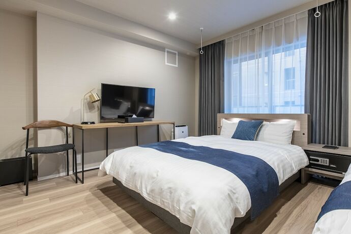 Imagen de la habitación del Hotel Aima. Foto 12