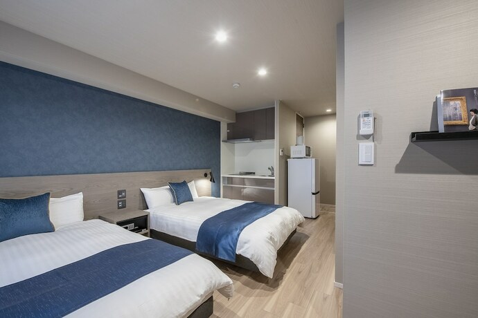 Imagen de la habitación del Hotel Aima. Foto 17
