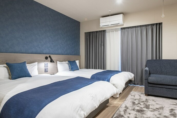 Imagen de la habitación del Hotel Aima. Foto 21