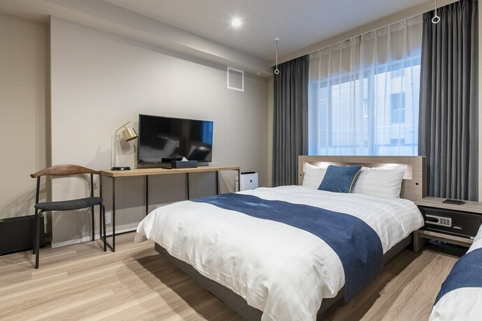 Imagen de la habitación del Hotel Aima. Foto 22