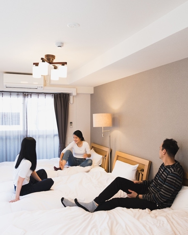 Imagen de la habitación del Hotel Ai-matsubara Kyogoku House. Foto 13