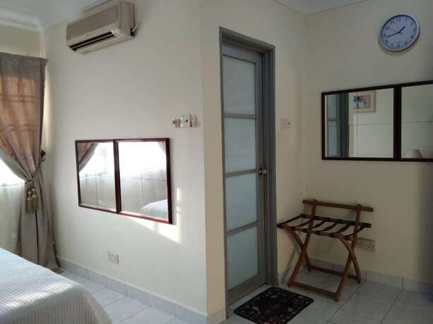 Imagen de la habitación del Hotel Aini's Guest House In Vista Amani Condo. Foto 16