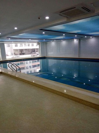 Imagen de la piscina del Hotel Aiqinhai. Foto 19