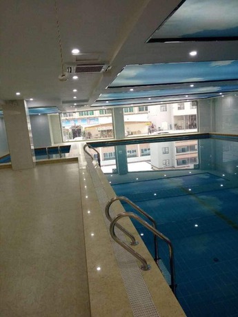 Imagen de la piscina del Hotel Aiqinhai. Foto 20