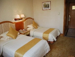 Imagen de la habitación del Hotel Aiqun East Building. Foto 6
