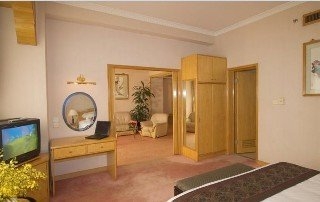 Imagen de la habitación del Hotel Aiqun East Building. Foto 8