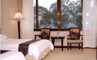 Imagen de la habitación del Hotel Aiqun East Building. Foto 10