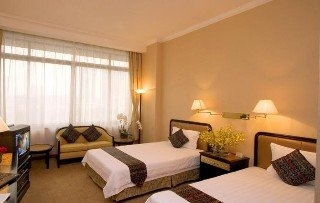 Imagen de la habitación del Hotel Aiqun East Building. Foto 11