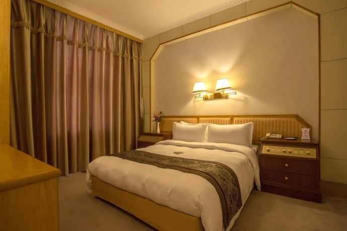 Imagen de la habitación del Hotel Aiqun. Foto 11