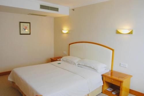 Imagen de la habitación del Hotel Air China Dalian. Foto 5