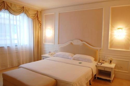 Imagen de la habitación del Hotel Air China Dalian. Foto 6