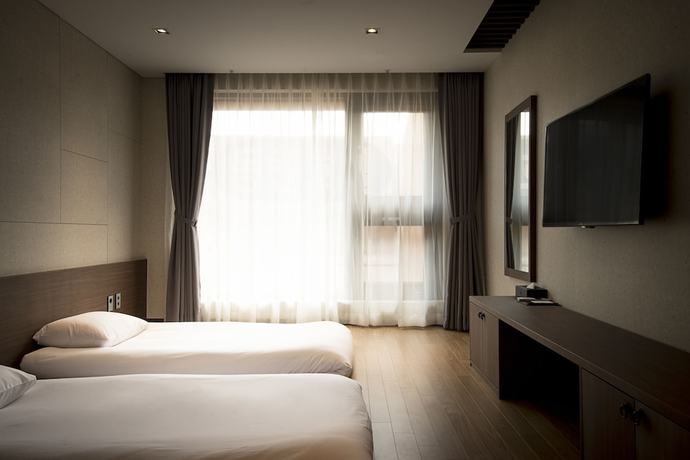 Imagen de la habitación del Hotel Air City Jeju. Foto 10