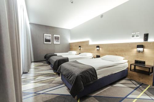 Imagen de la habitación del Hotel Air Hotel. Foto 14