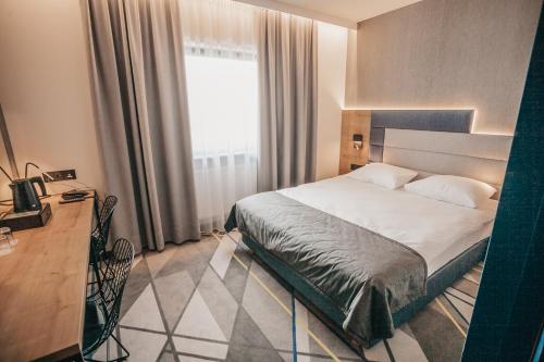 Imagen de la habitación del Hotel Air Hotel. Foto 15