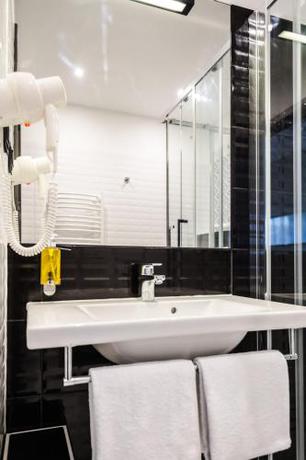 Imagen de la habitación del Hotel Air Hotel. Foto 19