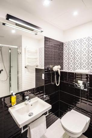 Imagen de la habitación del Hotel Air Hotel. Foto 20