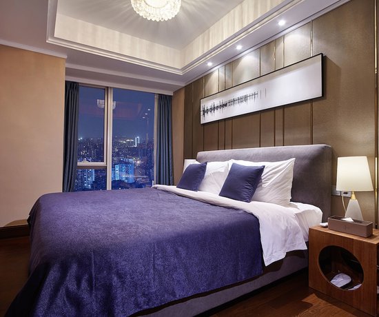 Imagen de la habitación del Hotel Air Suites Chunxi Chengdu. Foto 12