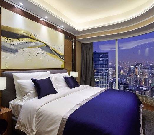 Imagen de la habitación del Hotel Air Suites Chunxi Chengdu. Foto 13