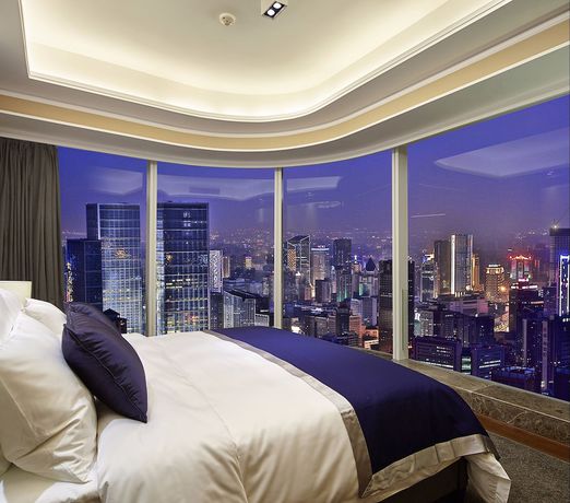Imagen de la habitación del Hotel Air Suites Chunxi Chengdu. Foto 14