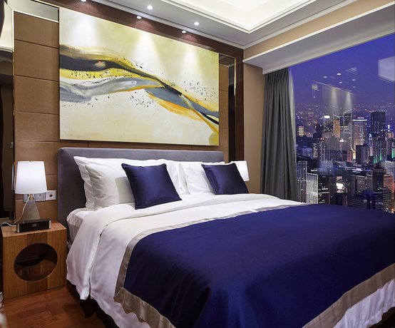Imagen de la habitación del Hotel Air Suites Chunxi Chengdu. Foto 15