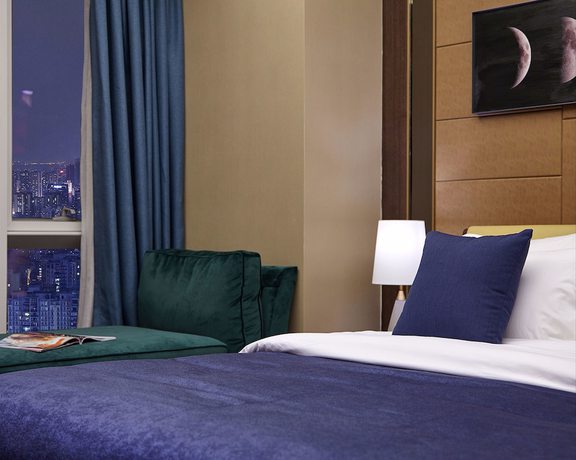 Imagen de la habitación del Hotel Air Suites Chunxi Chengdu. Foto 16