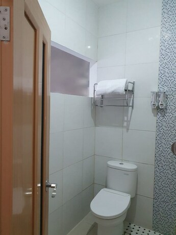 Imagen de la habitación del Hotel Aira Rooms Anggrek Serat Bsd. Foto 4