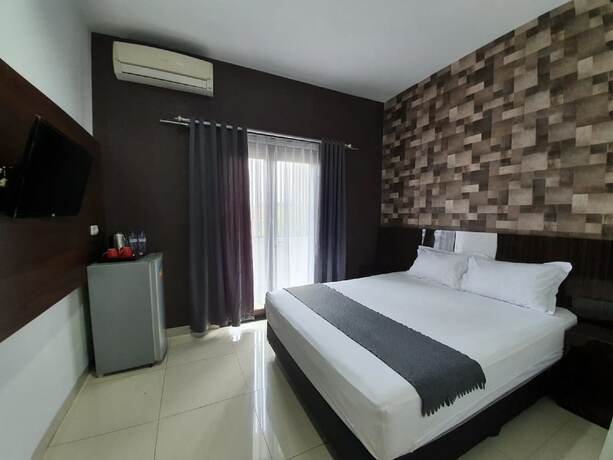 Imagen de la habitación del Hotel Aira Rooms Anggrek Serat Bsd. Foto 6