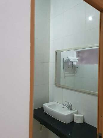Imagen de la habitación del Hotel Aira Rooms Anggrek Serat Bsd. Foto 8