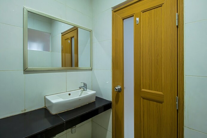 Imagen de la habitación del Hotel Aira Rooms Anggrek Serat Bsd. Foto 9