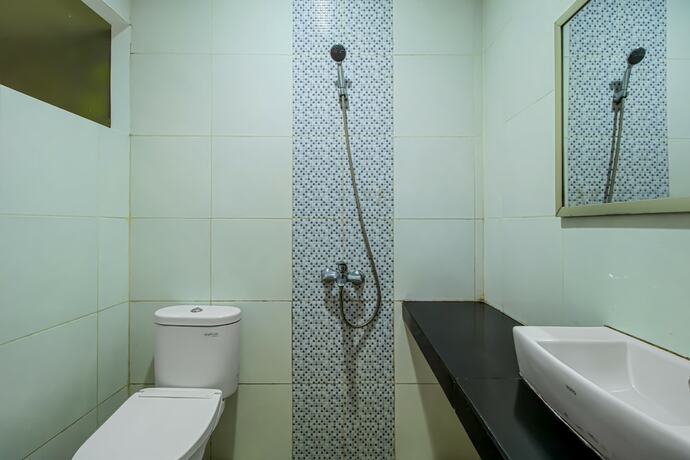 Imagen de la habitación del Hotel Aira Rooms Anggrek Serat Bsd. Foto 10