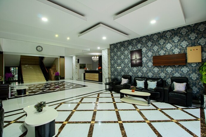 Imagen de los interiores del Hotel Aira Rooms Anggrek Serat Bsd. Foto 17