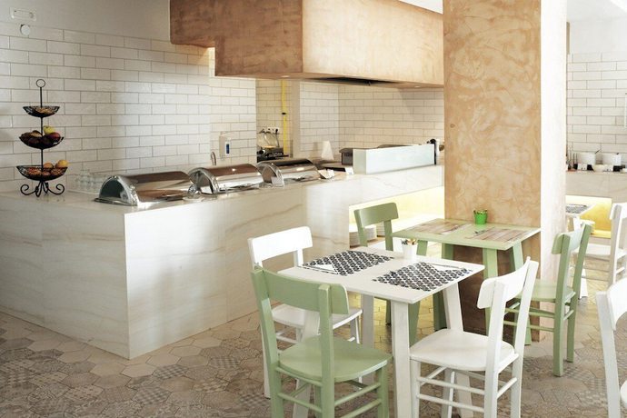 Imagen del bar/restaurante del Hotel Airis Boutique and Suites - Adults Only. Foto 5