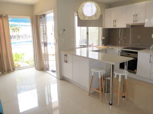 Imagen de la habitación del Hotel Airlie Apartments. Foto 2
