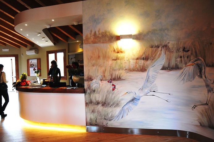 Imagen de la habitación del Hotel Airone Bianco Residence Village. Foto 4