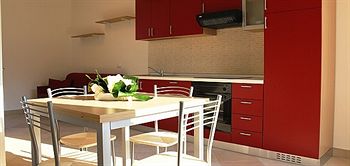 Imagen de la habitación del Hotel Airone Bianco Residence Village. Foto 5