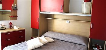 Imagen de la habitación del Hotel Airone Bianco Residence Village. Foto 8