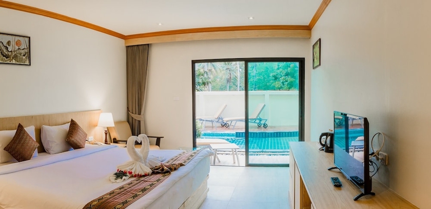 Imagen de la habitación del Hotel Airport Beach Hotel Phuket. Foto 2