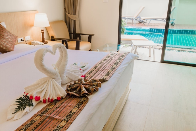 Imagen de la habitación del Hotel Airport Beach Hotel Phuket. Foto 3